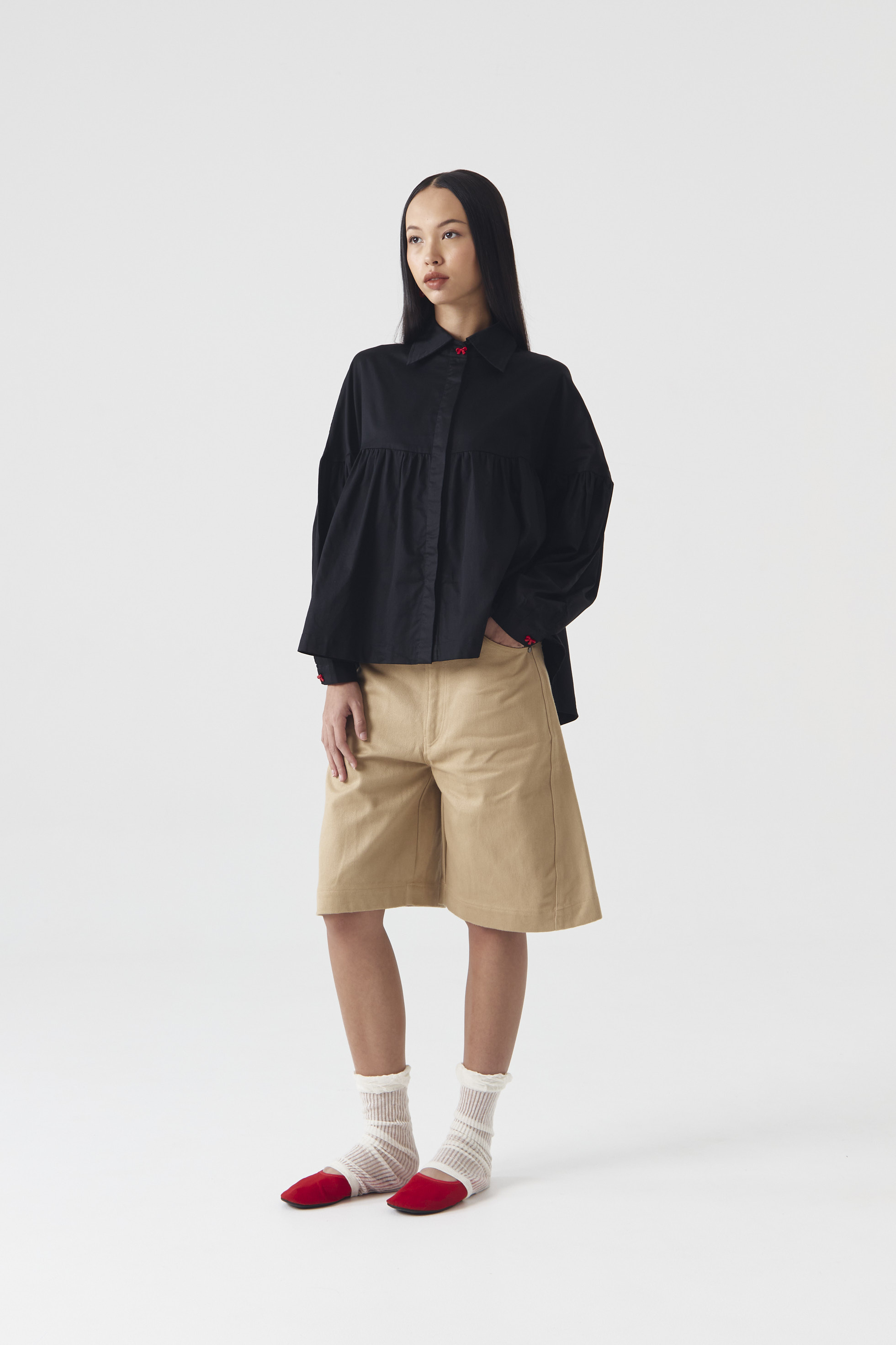 CHÉRI SURGE Black Ruffle Blouse