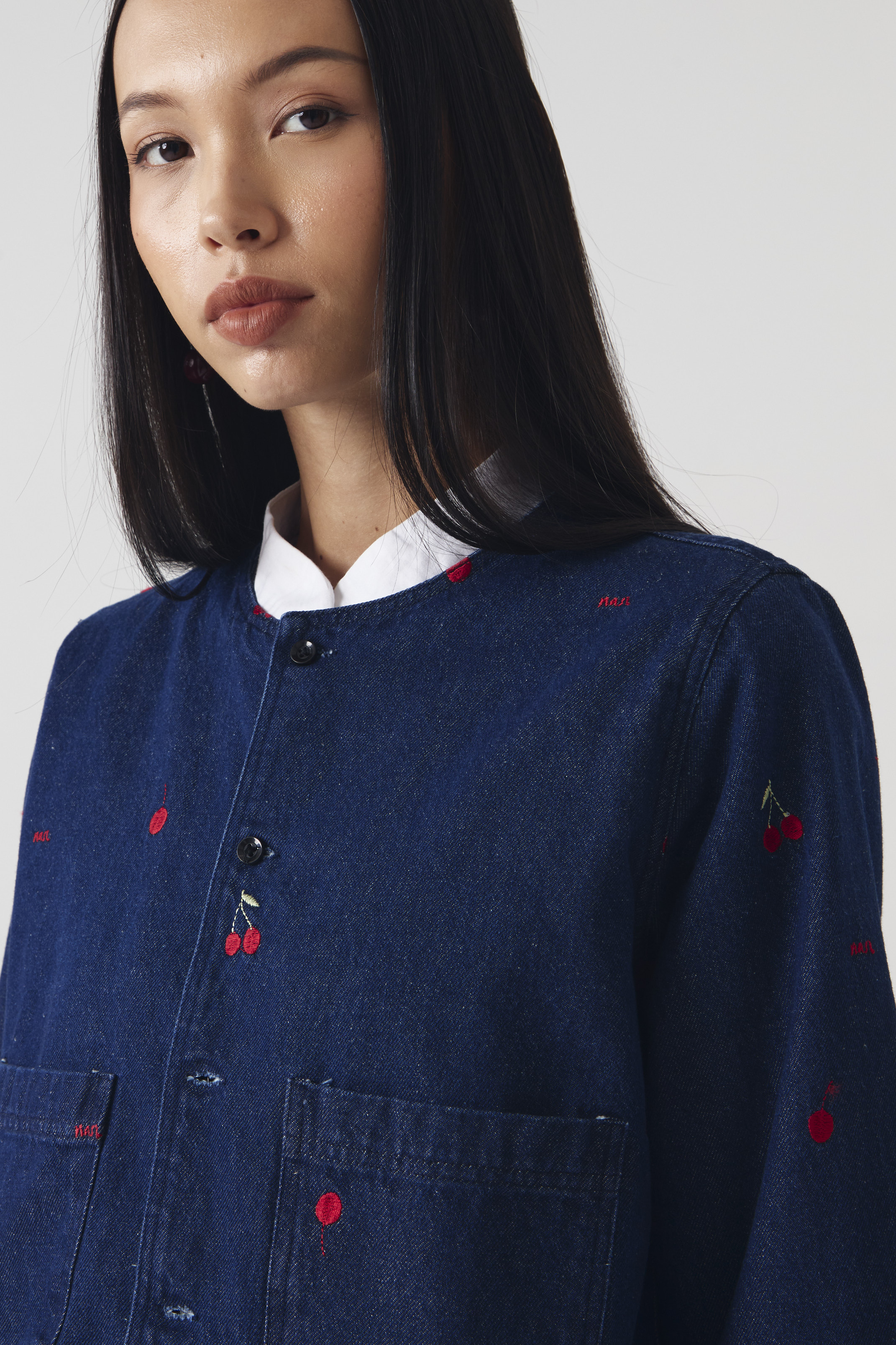 CHÉRI SURGE Denim Embro Top